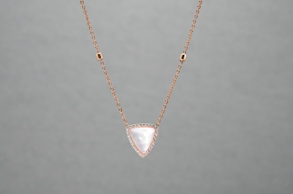 Triangle pendant on a necklace