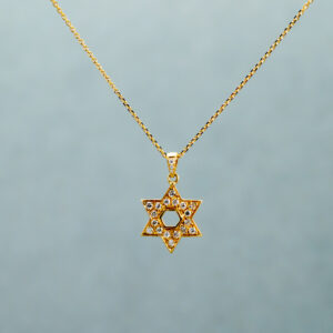 Star of David Gold necklace with small gemstones 