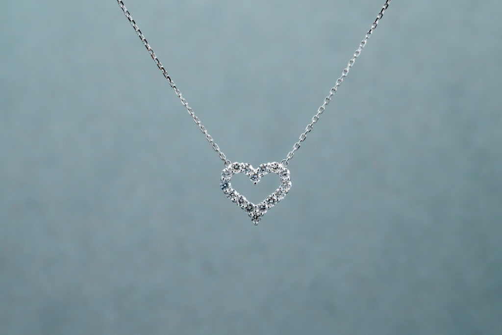 A necklace with a heart-shaped pendant 