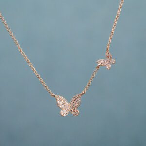 A White Gold necklace with two Butterfly-shaped pendants 