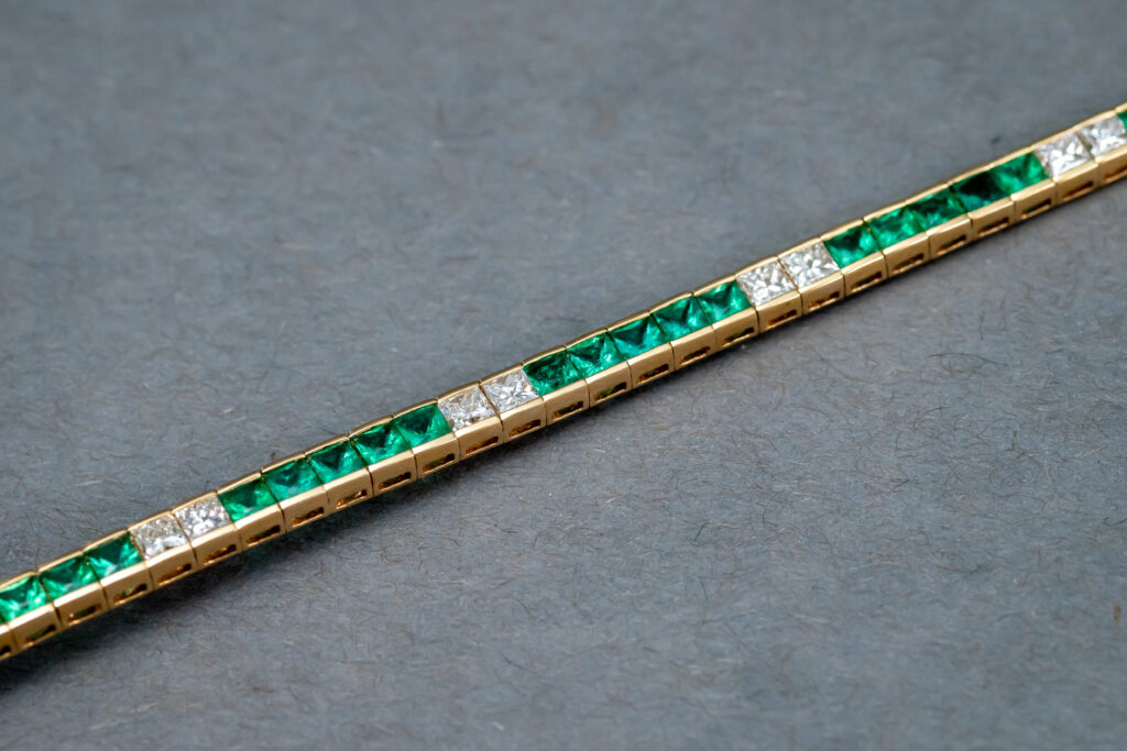 14k Yellow Gold Emerald and Diamond bracelet 