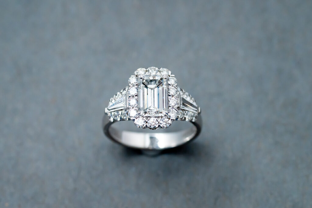 18k white gold engagement ring with one emerald cut diamond  