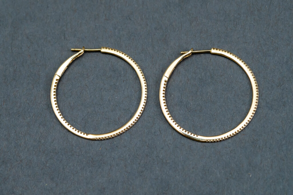A 14k Yellow Gold Diamond hoop earrings 