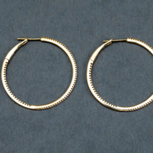 A 14k Yellow Gold Diamond hoop earrings 