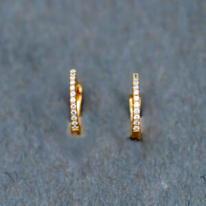 A 14k Yellow Gold Diamond Huggie earrings 