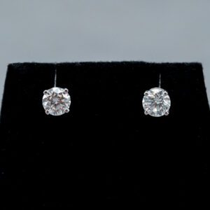 A unique set of 14k White Gold Diamond stud earrings 