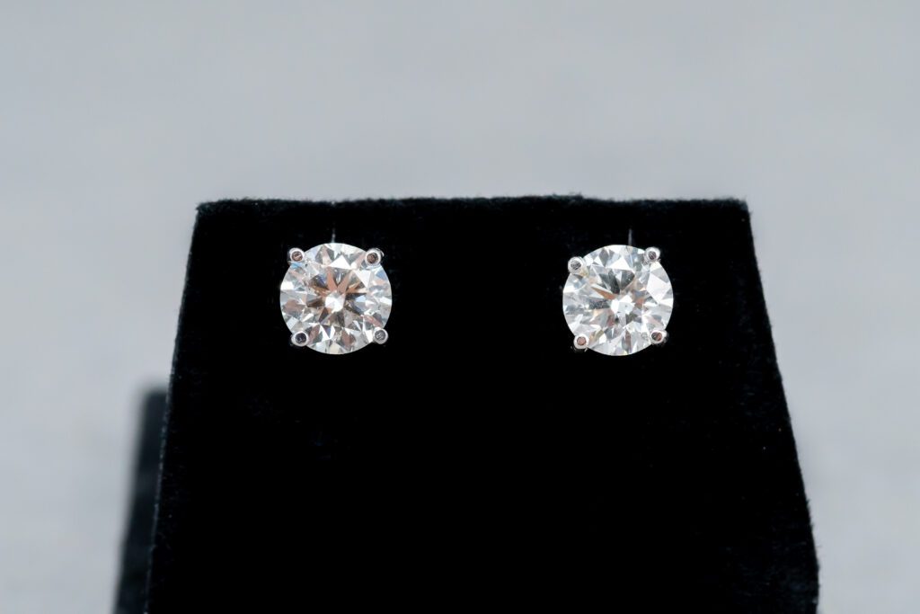 A set of 14k White Gold Diamond Stud earrings