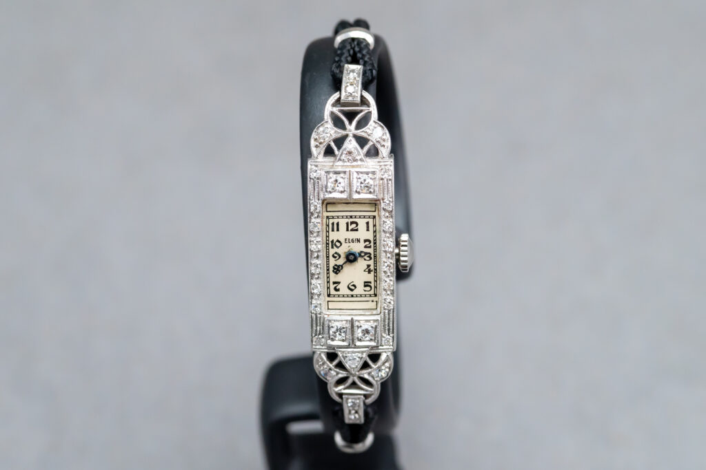 A silver and gold platinum Diamond antique watch 