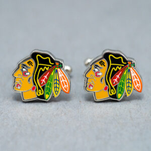 A pair of chicago blackhawks cufflinks.