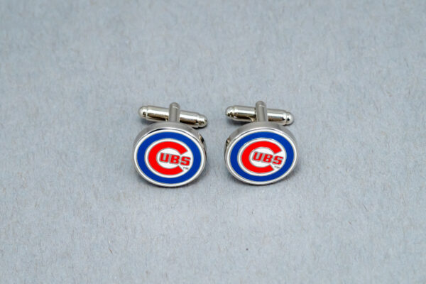 A pair of chicago cubs cufflinks.
