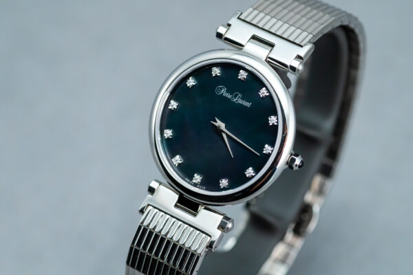 A watch is shown with the face of it.