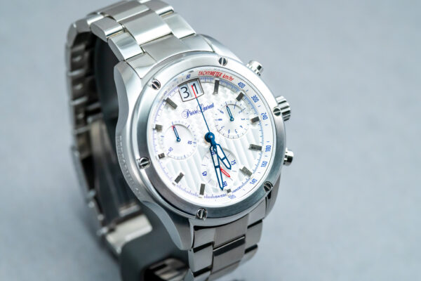 A silver watch with a white face and blue hands.