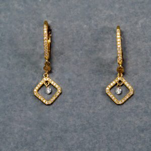 A pair of gold earrings with diamond shaped dangling from the bottom.