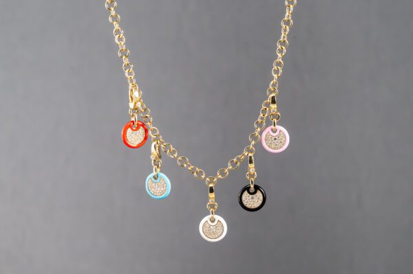 A gold chain with five different colored charms.