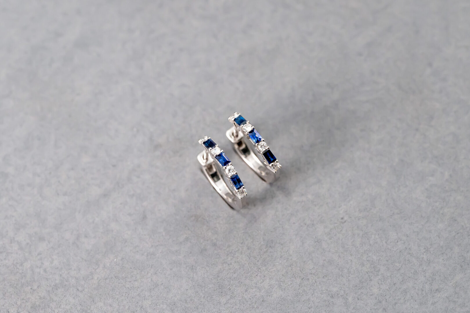 14k White Gold Diamond and Sapphire Hoop Earrings - Image 2